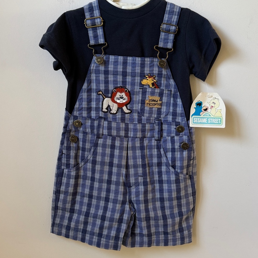 Sesame Street 2pc Blue Plaid Overalls and Navy Shirt NWT Boy’s Size 24 months.